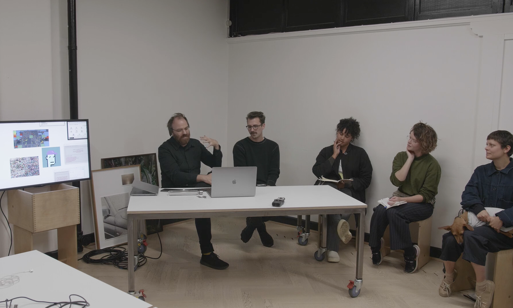an image of artists discussing the project
